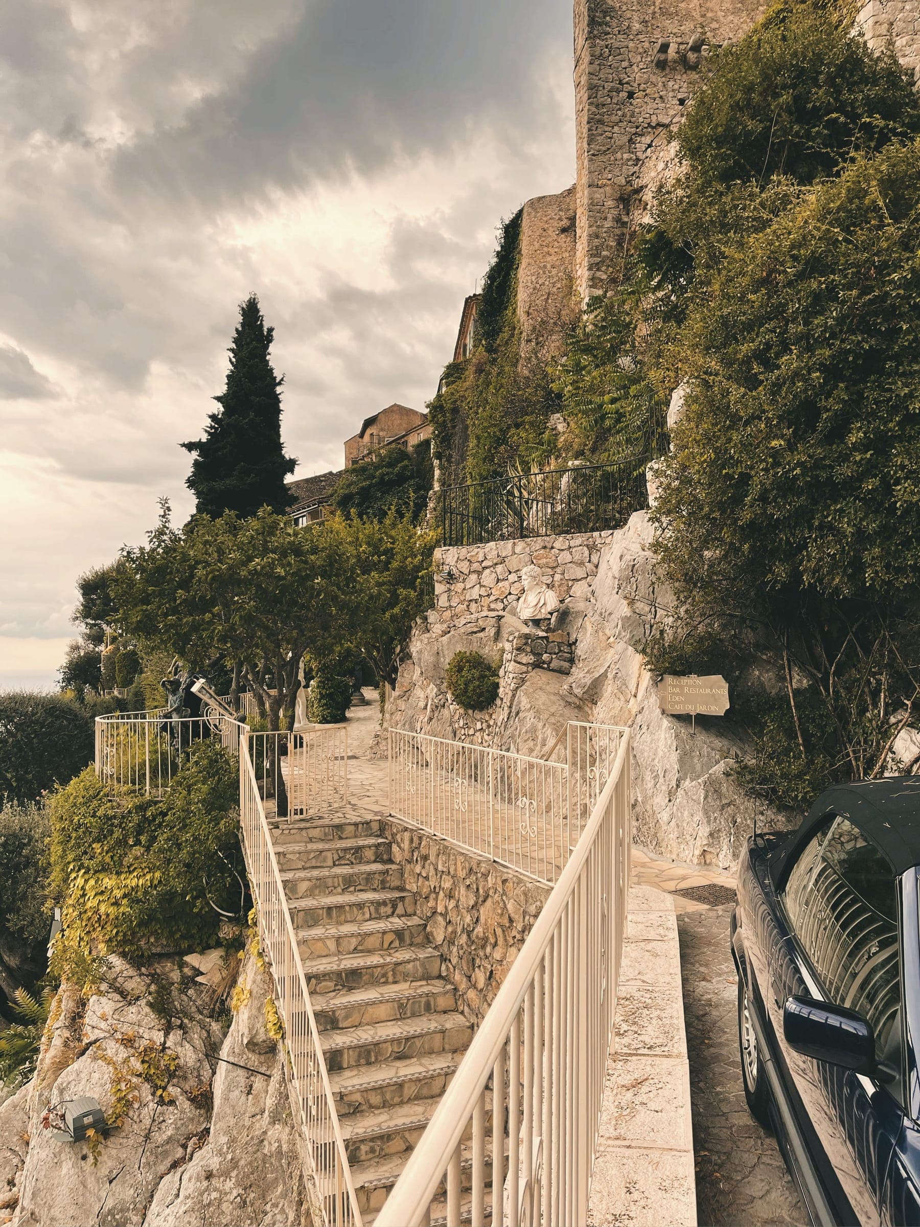 Stone steps and a cypress in Èze